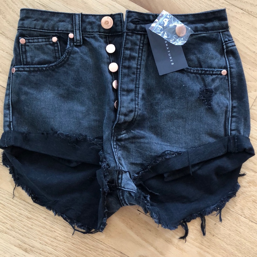 Distressed denim shorts